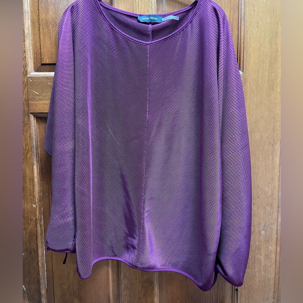 Ivanka Trump purple dress top with tie sleeves